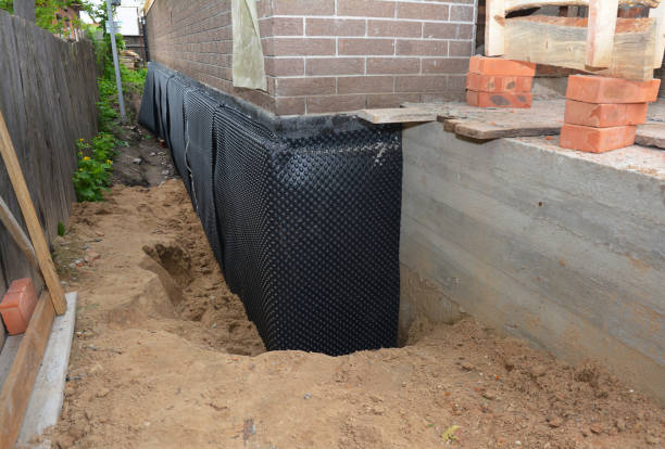 Happy homeowners after waterproofing job in Colmar
